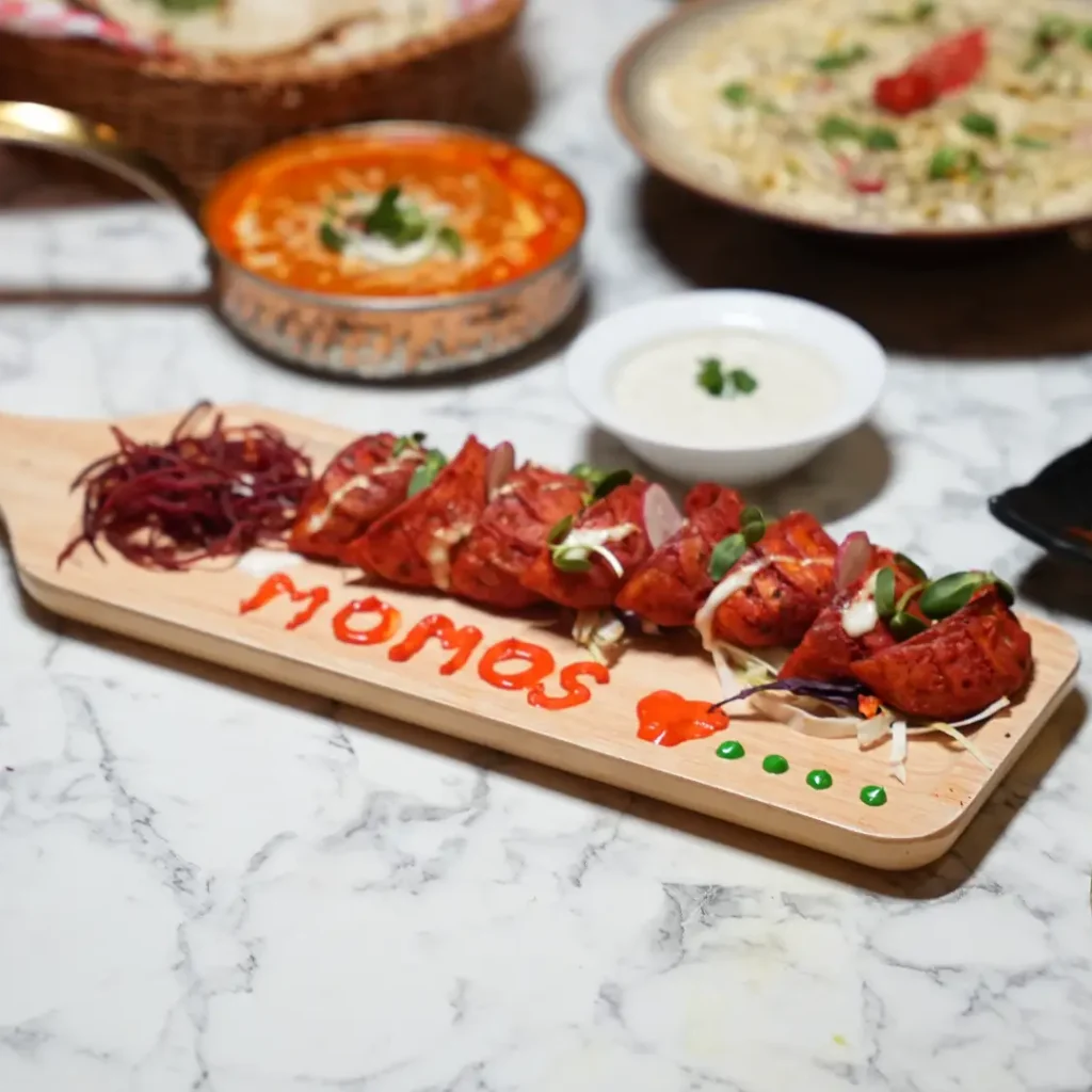 momos served  with other dishes at punjabland brampton